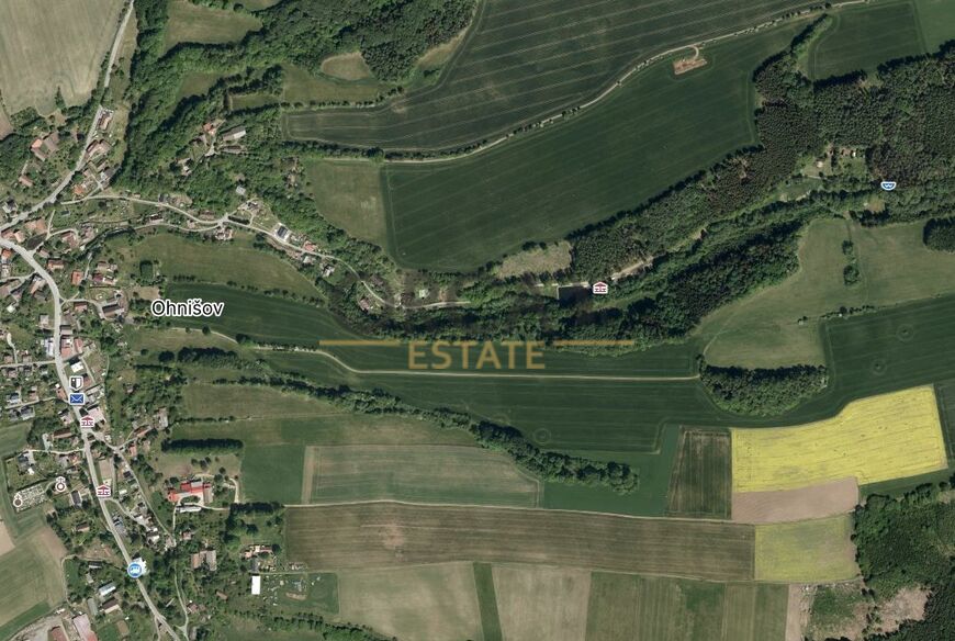 Prodej 1/4 podílu pozemků v k.ú. Ohnišov,část z nich plochy rekreace, podílová výměra činí 41519 m2